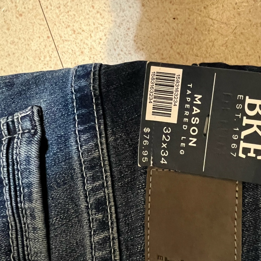 Men’s Buckle jeans. Mason tapered leg size 32 X 34. New with tags